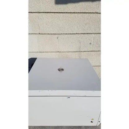 White rectangular beckman coulter spinchron dlx benchtop centrifuge outdoor unit with circular top vent