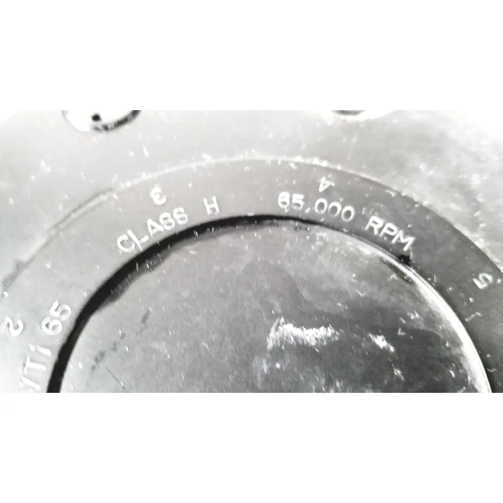 Black circular dial with engraved white text class h and 65,000 rpm on beckman coulter ultracentrifuge unit