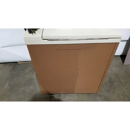 Tan metal cabinet with white top and silver hinge of beckman j2-21 refrigerated centriifuge for laboratory use