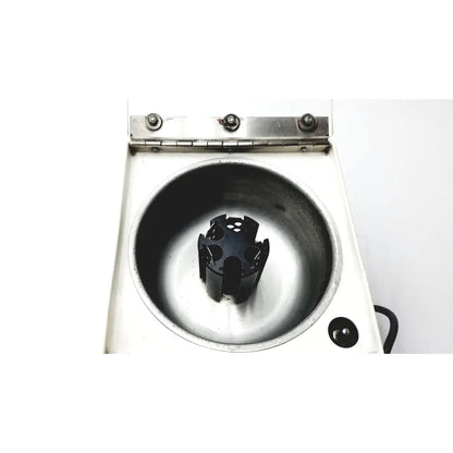 White laboratory centrifuge beckman microfuge with a black 6-position rotor designed for reuse medical applications