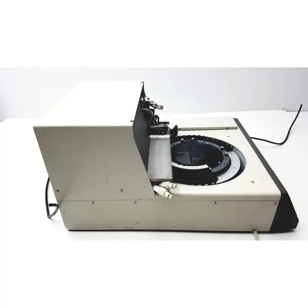 Beckman System Gold autosampler 507 in beige and black with circular rotating platform for hplc laboratory reuse medical use