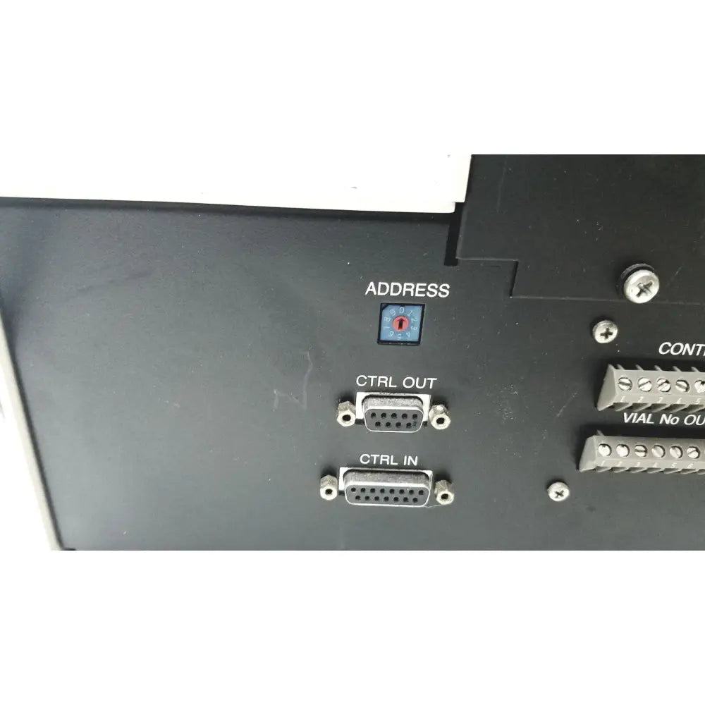 Black industrial control panel with labeled ports and blue address switch on beckman system gold autosampler 507 for hplc laboratory reuse medical applications