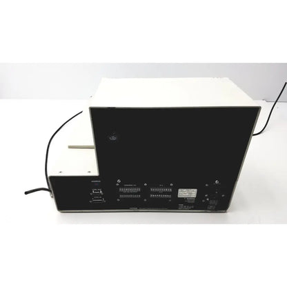 Backside of white and black beckman system gold autosampler 507 with multiple ports for hplc laboratory reuse medical use