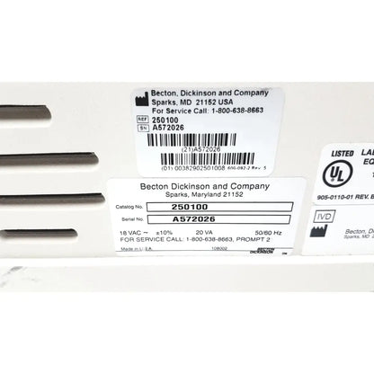 White plastic industrial electrical enclosure with labels and barcodes for becton dickinson microprobe processor laboratory equipment
