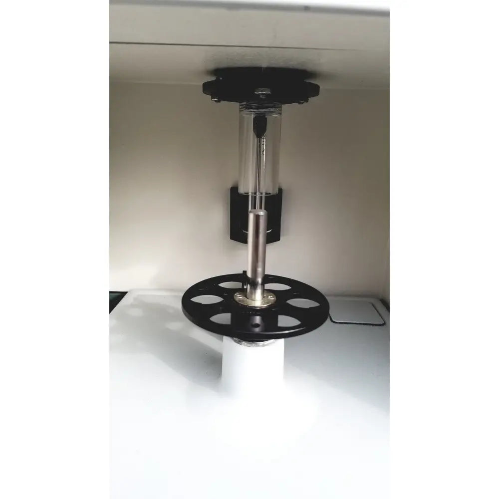 Black and silver laboratory centrifuge rotor with transparent chamber on white base for becton dickinson facscalibur flow cytometer