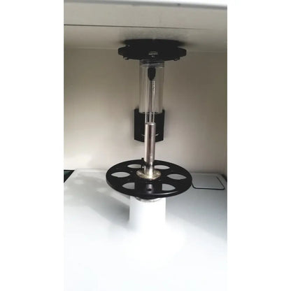 Black and silver laboratory centrifuge rotor with transparent chamber on white base for becton dickinson facscalibur flow cytometer