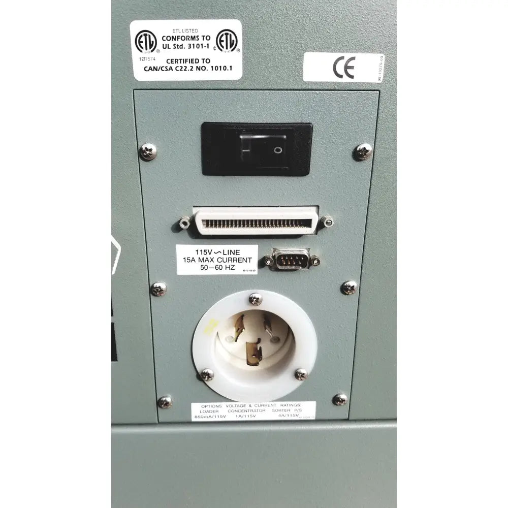 Back side of gray industrial power supply unit with black toggle switch and iec socket for becton dickinson facscalibur flow cytometer