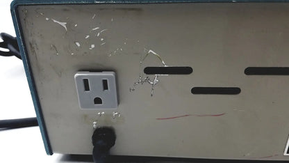 Gray plastic power outlet with scratches on the back of the bellco orbital shaker 7744-02020 as-is unit