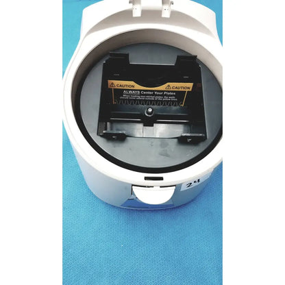 White plastic benchmark platefuge c2000 microplate microcentrifuge with black plate holder and yellow caution label inside