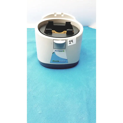 White and gray benchmark platefuge c2000 microplate microcentrifuge with black rotor inside for laboratory use