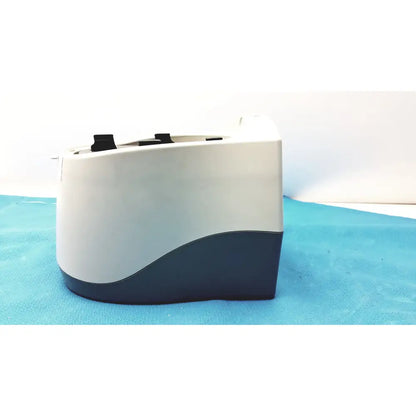 White and dark gray two-slice toaster with sleek modern design featured alongside benchmark platefuge c2000 microplate microcentrifuge