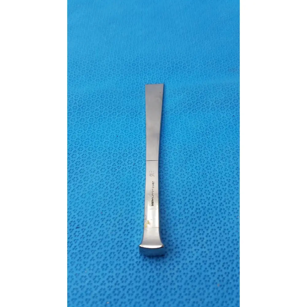 Silver benn stainless surgical instrument 18m with flat rectangular blade and curved handle for medical use