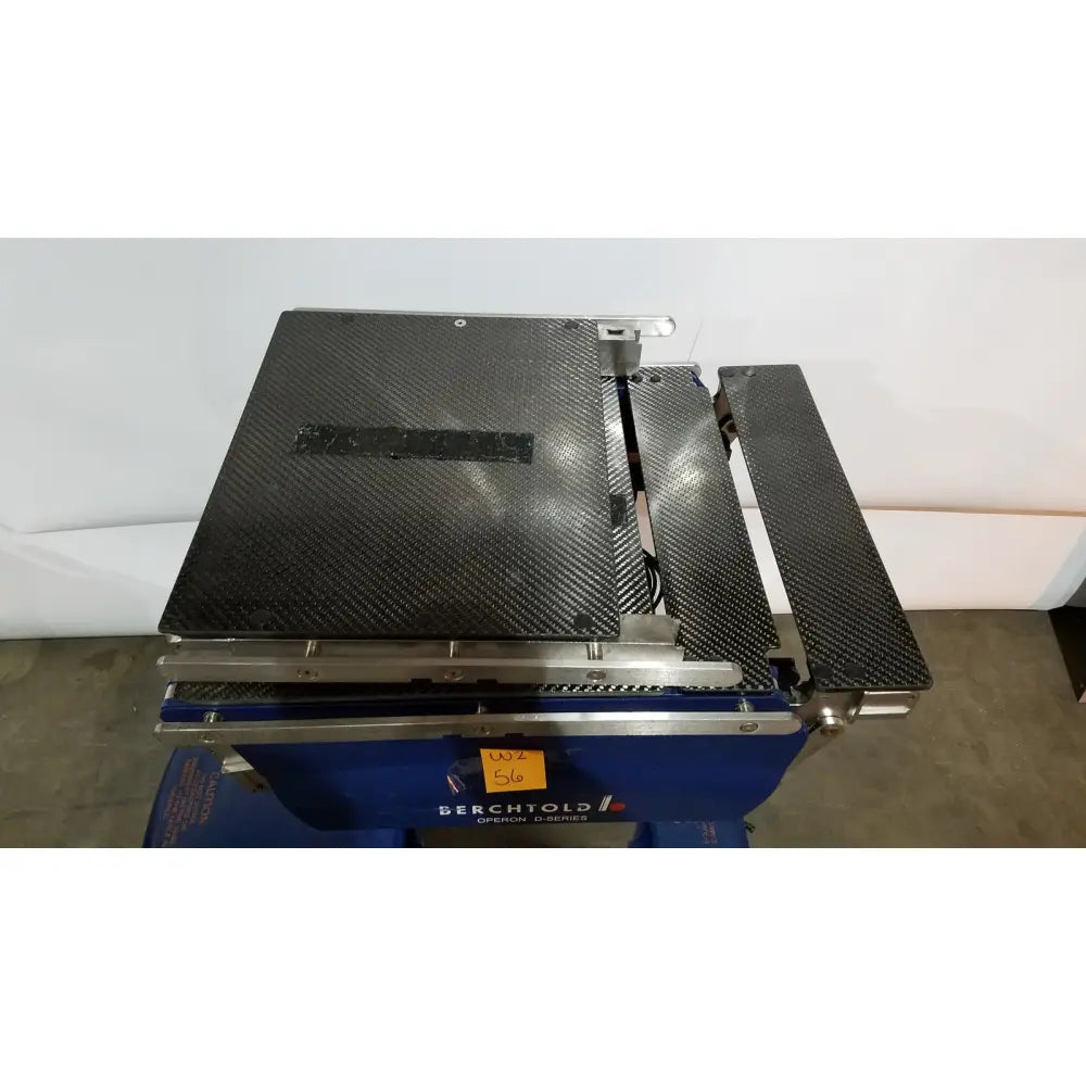 Blue berchtold d850 operon surgical table saw with carbon fiber top and metal guide rail for precise operations