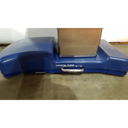 Blue plastic Berchtold D850 Operon surgical table weighing scale with metallic handle for precise medical use