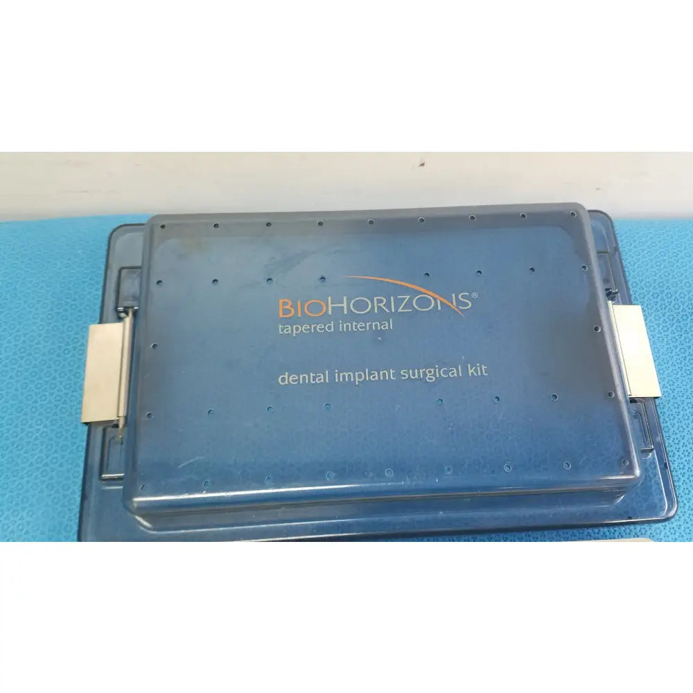 Blue plastic case for bio horizons tapered internal dental implant surgical kit designed for precise implant placement