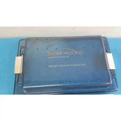 Blue plastic case for bio horizons tapered internal dental implant surgical kit designed for precise implant placement