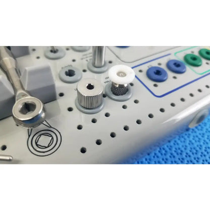 Silver textured screwdriver with hexagonal socket head for Bio Horizons tapered internal dental implant surgical kit