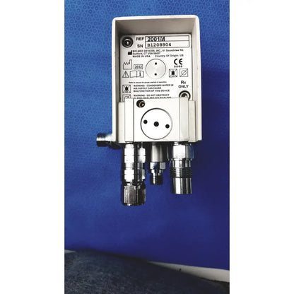 Silver metallic air oxygen blender with three threaded ports model ref 2001m by bio-med devices inc for medical use