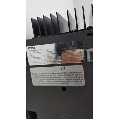 Black bio-rad chef-dr ii control module with metallic label showing technical specs and serial no 961br g-cir-r7-17k