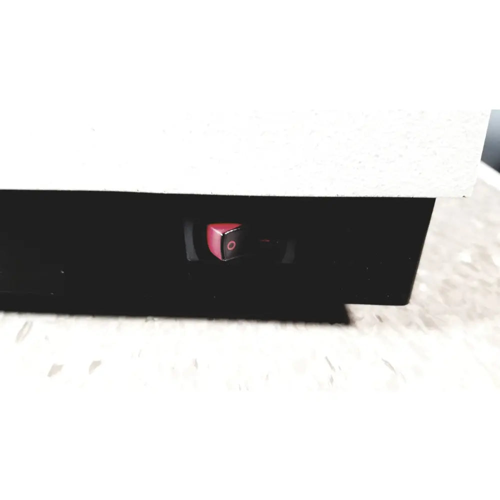 Red toggle power switch on black panel of bio-tek instruments elx800 universal microplate reader absorbance unit