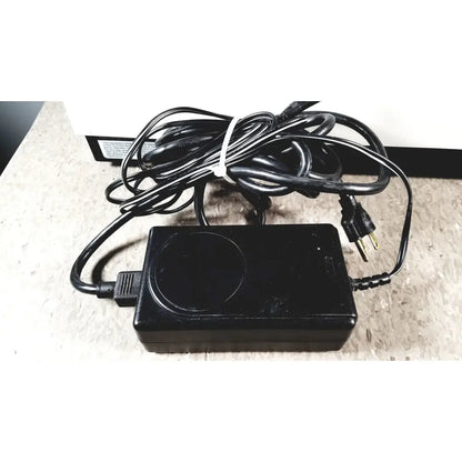 Black plastic power adapter with coiled cord for bio-tek instruments elx800 universal microplate reader 24vdc 40 watt