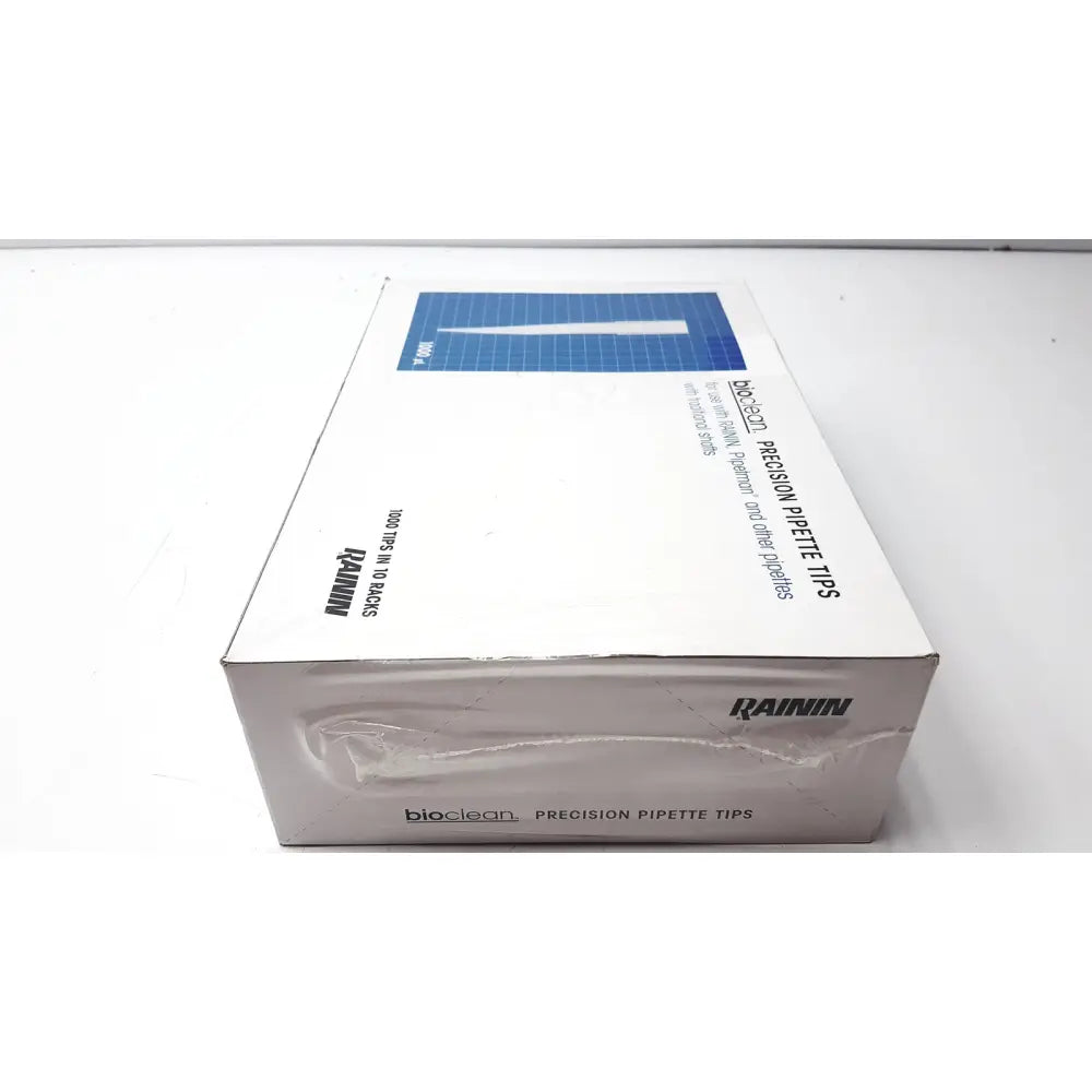 White cardboard box of rainin bioclean precision pipette tips 1000ul containing 1000 tips in 10 racks