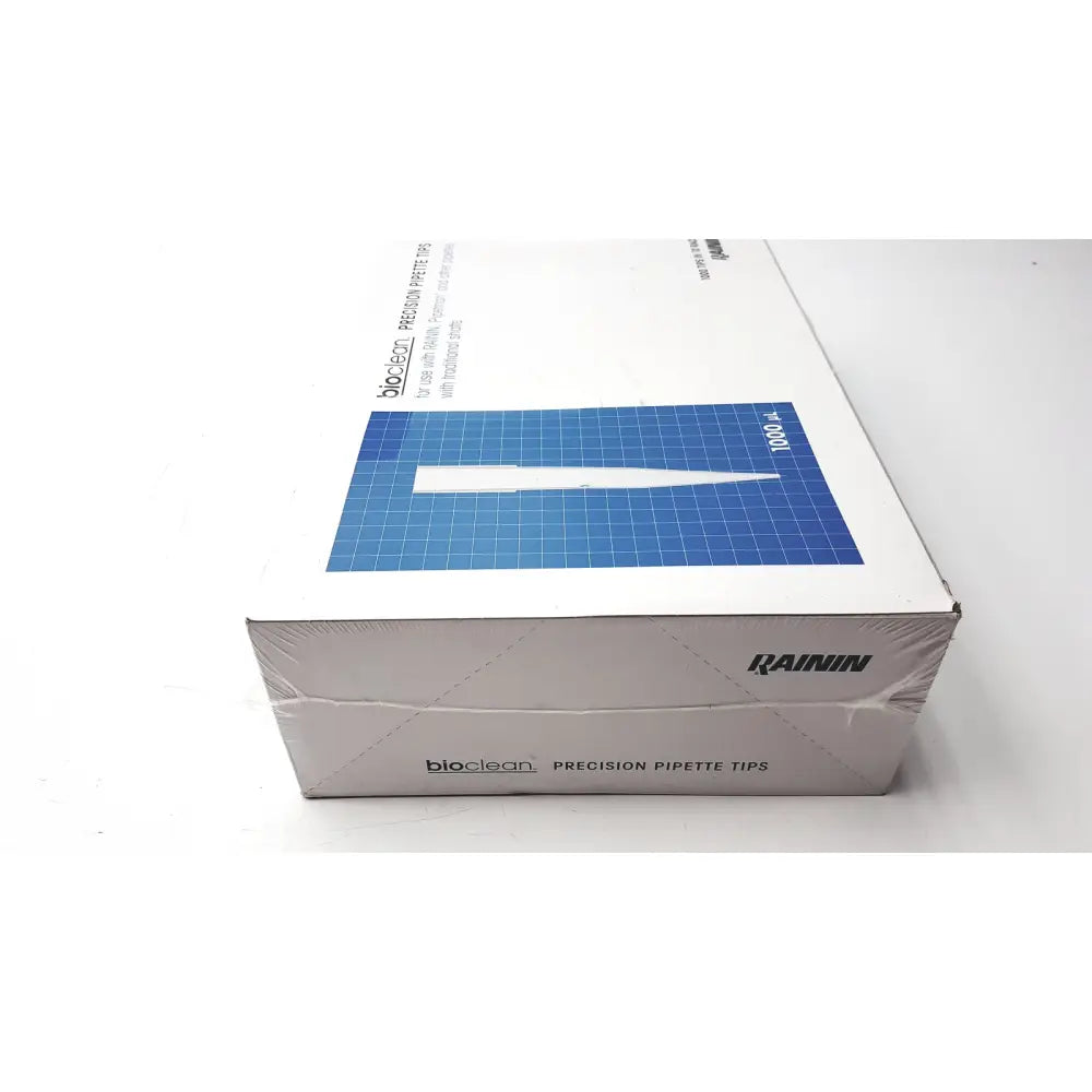 White cardboard box with blue grid design labeled bioclean precision pipette tips 1000ul 1000 tips in 10 racks by rainin