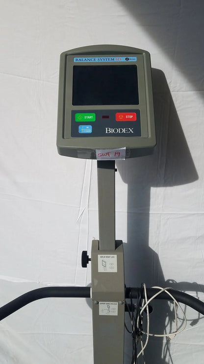 Gray biodex 950-300 balance system sd 3d exercise machine with digital display and control buttons for balance assessment serial number 0705499