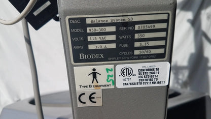 Gray metallic biodex 950-300 balance system sd with technical specifications label showing serial number for balance assessment