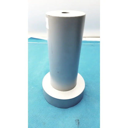 Gray cylindrical biodex medical systems wipe test counter with white base top and central hole for systems wipe test use