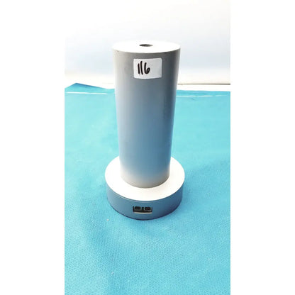 Gray cylindrical usb charging stand with white base and dual usb ports for biodex medical systems wipe test counter