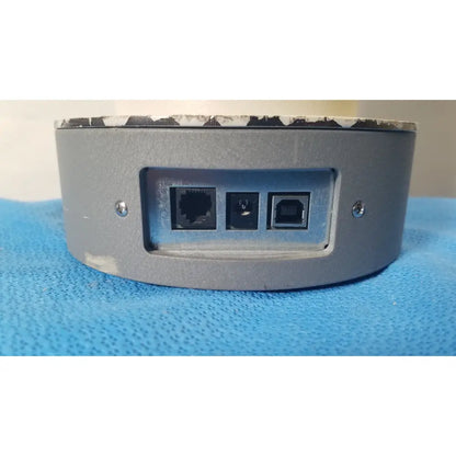 Back side of a gray cylindrical biodek well counter 187-602 network device with ethernet usb type-b and circular ports for reuse medical