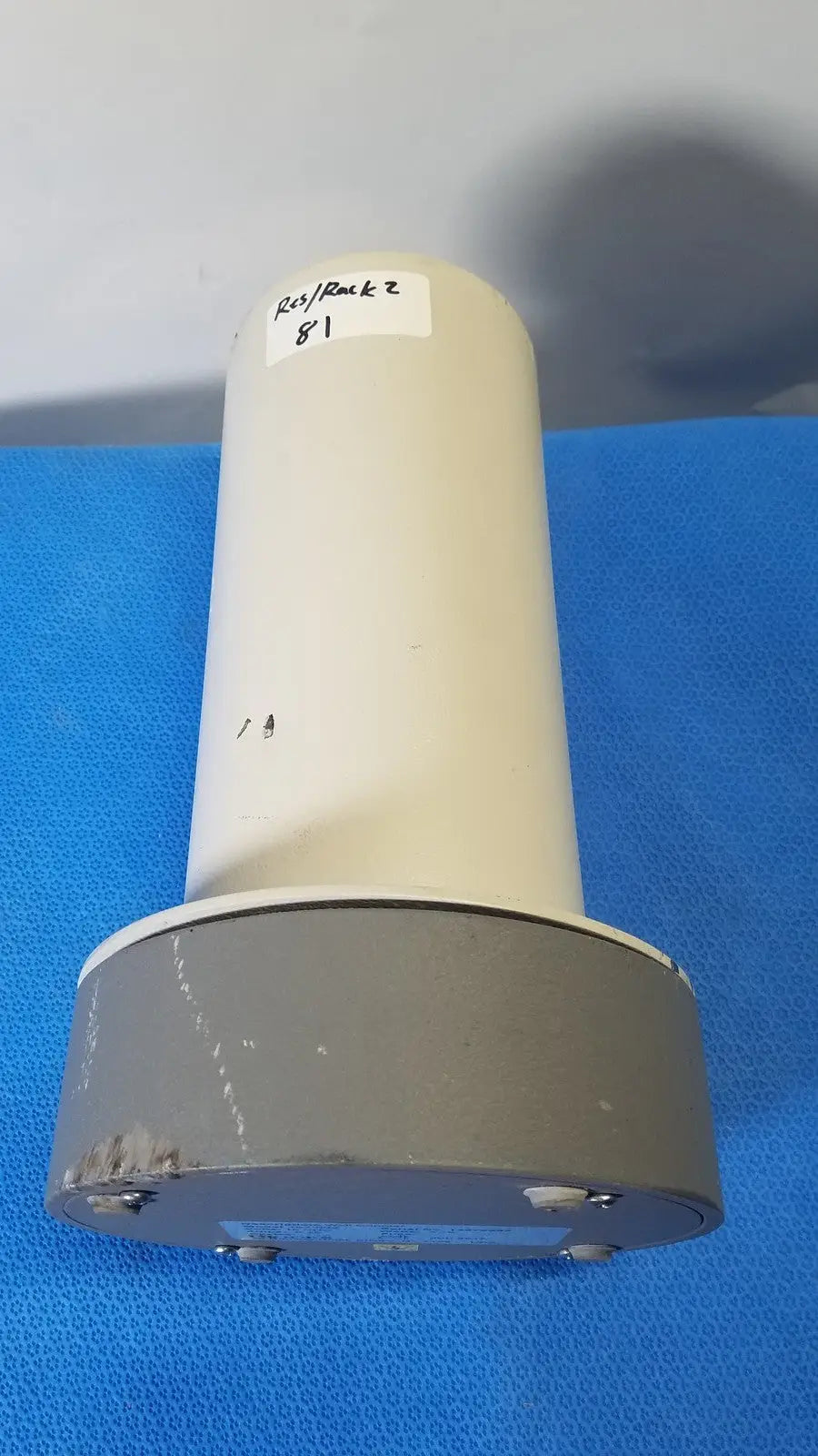 Beige cylindrical biodex well counter device with gray base labeled ray rock 2 for reuse medical applications