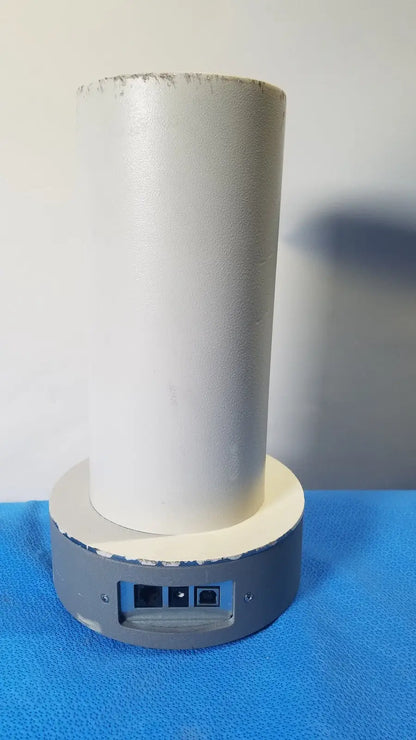 White cylindrical biodex well counter 187-602 base with gray platform, ethernet ports, power button for reuse medical settings