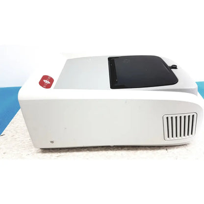 White plastic biofire diagnostics filmarray 2.0 PCR system with black lid and vent grille for multiplex PCR testing