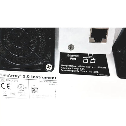 White ethernet port with black voltage and amperage label on the back of biofire diagnostics filmarray 2.0 pcr system