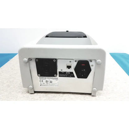 Rear side of white plastic biofire diagnostics filmarray 2.0 instrument with black ventilation grille and ethernet port