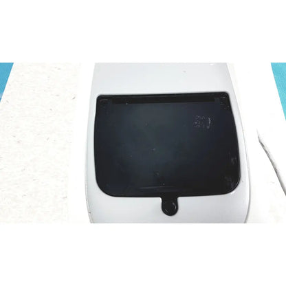White plastic car sunroof with black glass panel and circular handle on biofire diagnostics filmarray 2.0 pcr system
