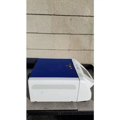 White and blue biomerieux previ color gram 414292 automatic slide stainer with sleek modern desktop design