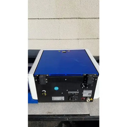 Biomerieux previ color gram automatic slide stainer in blue and white with black panels and metallic frame showing multiple ports