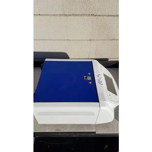 Biomerieux previ color gram 414292 automatic slide stainer in white and blue with digital display on the right side