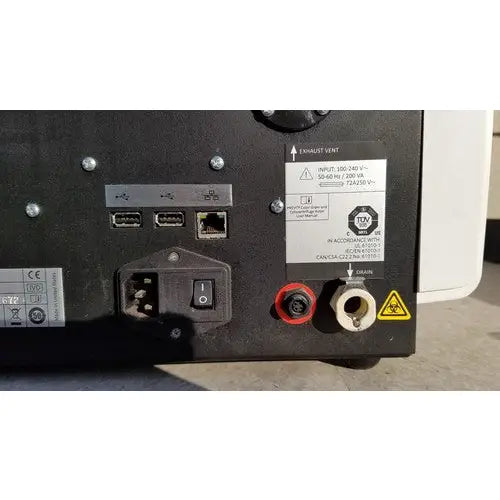 Black plastic back panel with multiple ports and labels of biomerieux previ color gram 414292 automatic slide stainer