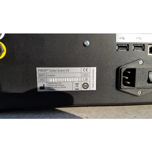 Black biomerieux previ color gram 414292 automatic slide stainer with white label showing reference serial and manufacturer details