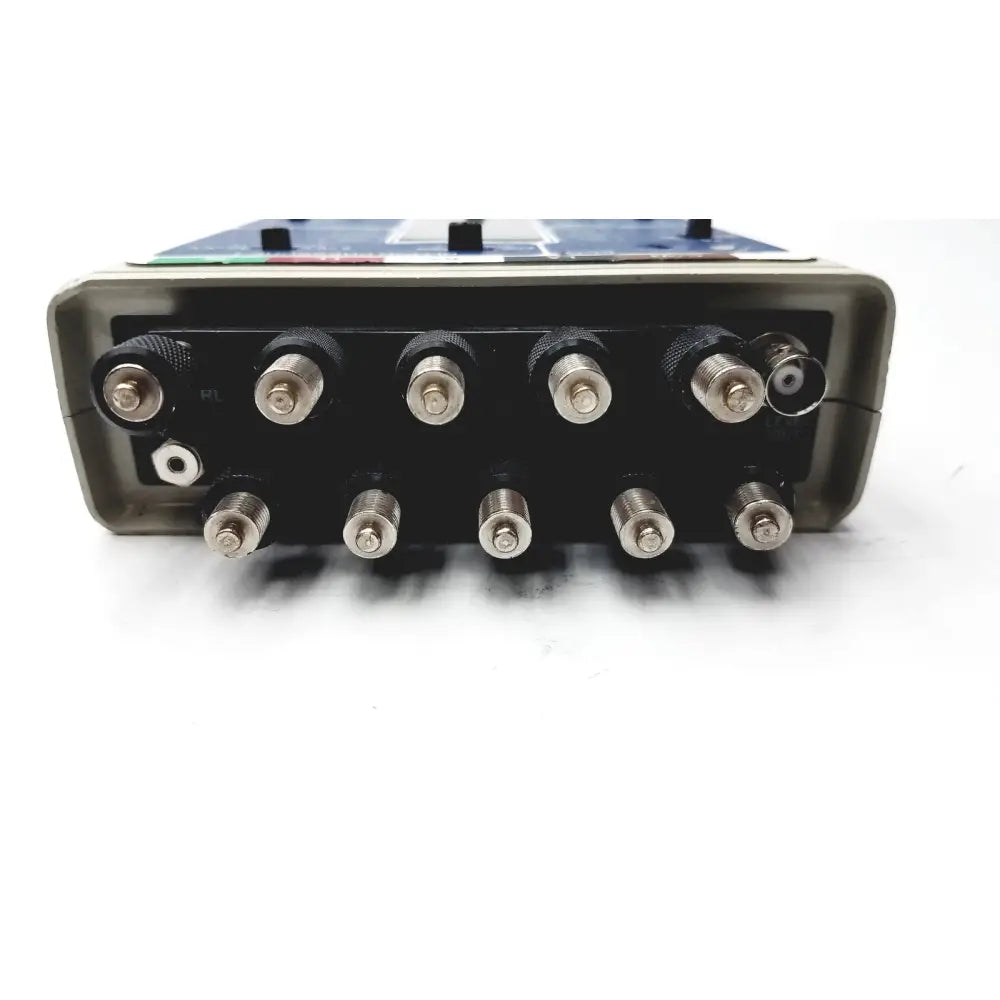 Rear panel of black and gray biotek lionheart multiparameter simulator with multiple silver bnc connectors untested