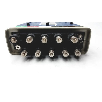 Rear panel of black and gray biotek lionheart multiparameter simulator with multiple silver bnc connectors untested