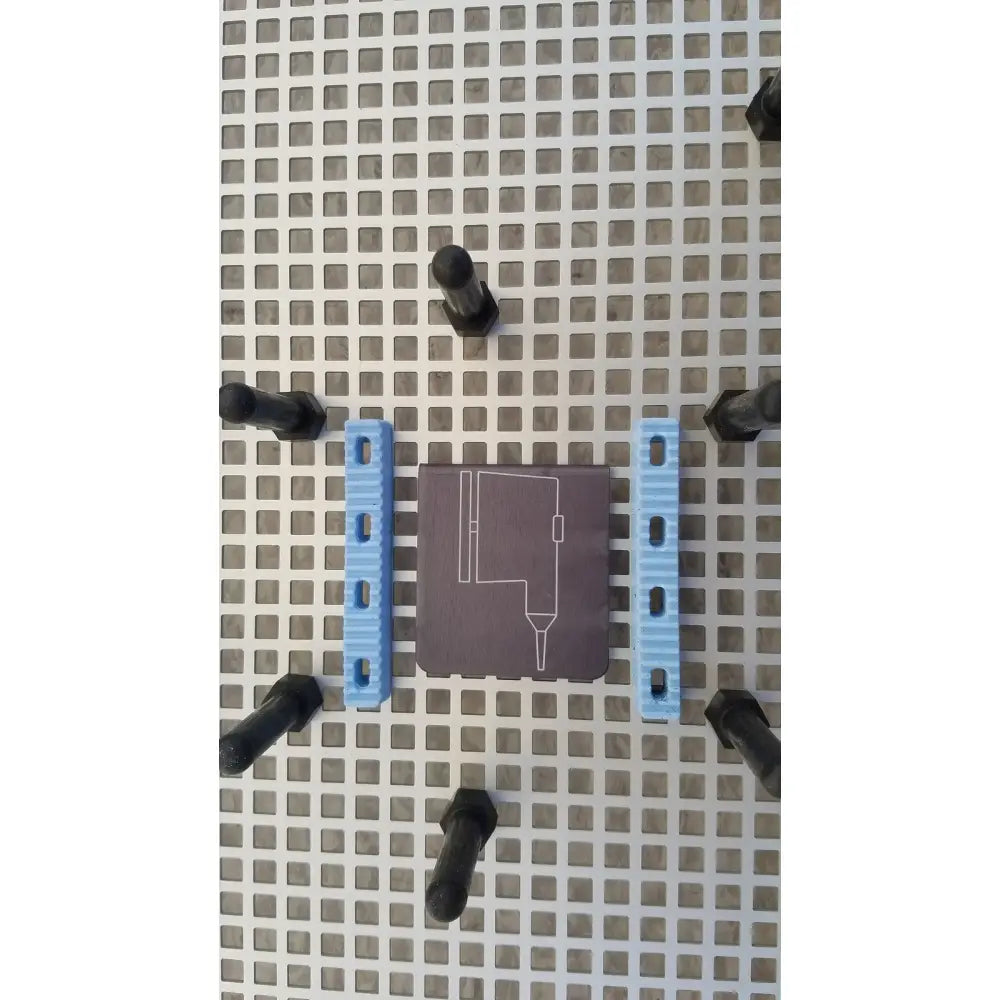 Dark brown summit medical UA2438 instrument sterilization tray with white schematic outline and blue mounting brackets