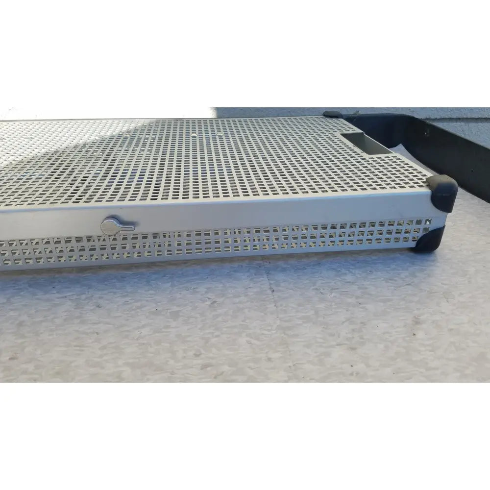 Silver perforated metal sterilization tray with black rubber corners and keyhole latch by summit medical ua2438