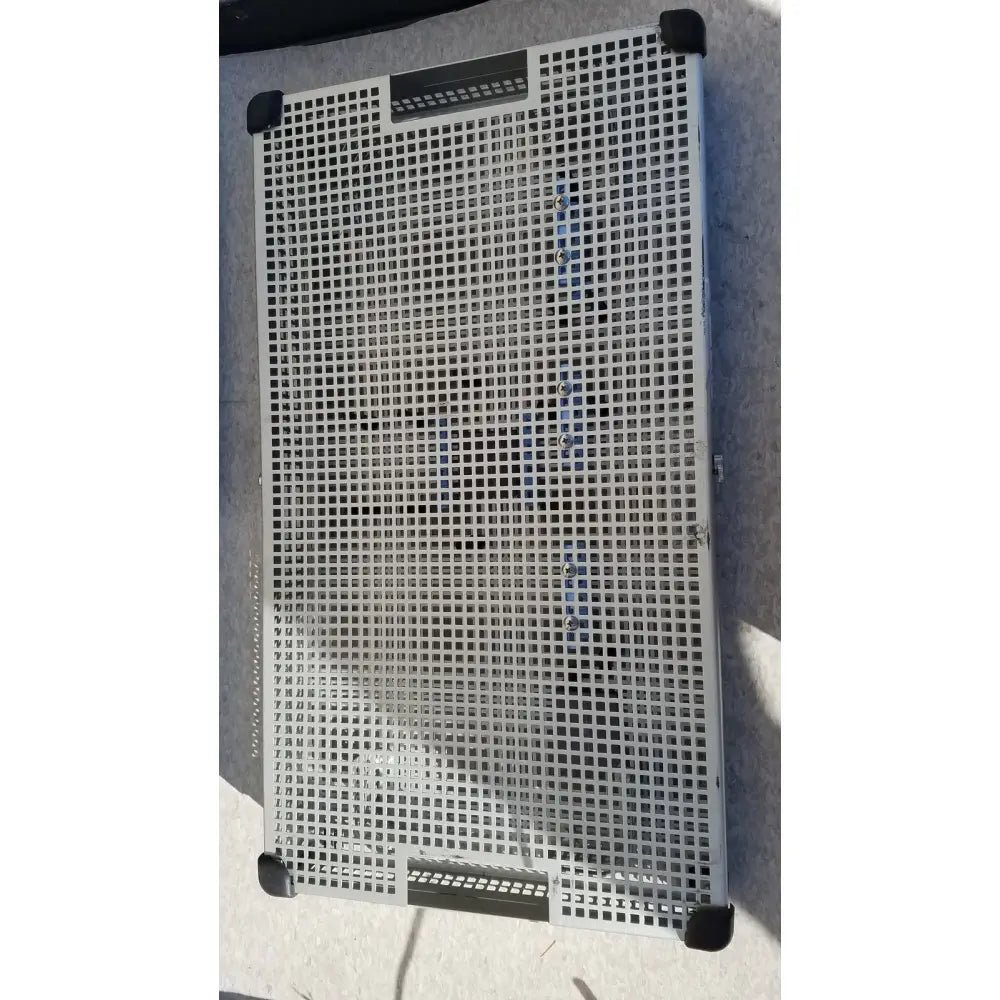 Gray plastic industrial crate with grid pattern and black corner protectors summit medical ua2438 instrument tray