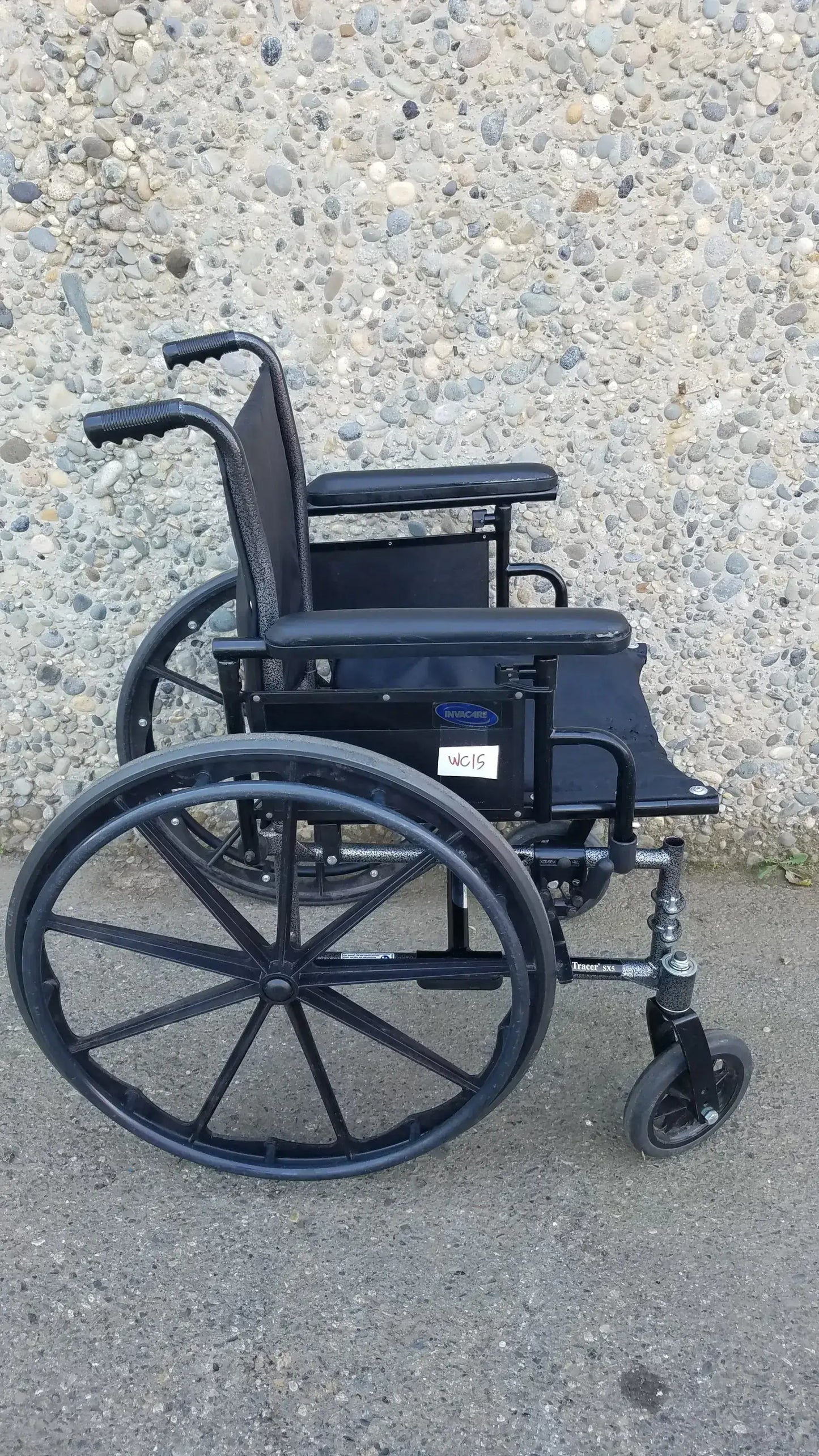 Reuse Medical Equipment Black Invacare Tracer SX5 Wheelchair Featuring Sturdy Arm Rests Wheelchairs, second-hand product photo 1