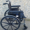 Black Invacare Tracer SX5 Wheelchair Featuring Sturdy Arm Rests